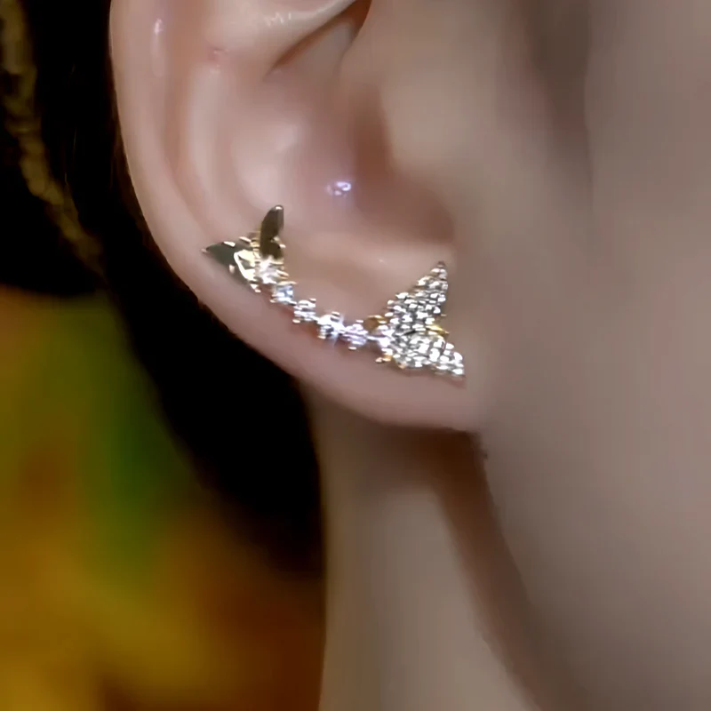 Elegante sommerfugl-crawler-øredobber med zirkon